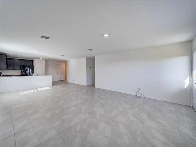 14832 Bridge Pass Trl, Fort Worth, TX 76052 - unfurnished living room with recessed lighting