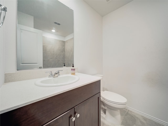 14832 Bridge Pass Trl, Fort Worth, TX 76052 - bathroom with vanity, toilet, tile patterned flooring, and baseboards