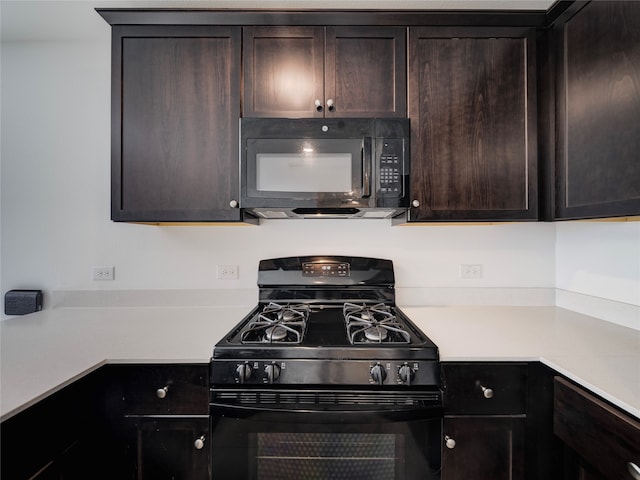 14832 Bridge Pass Trl, Fort Worth, TX 76052 - kitchen with black appliances, light countertops, and dark brown cabinetry