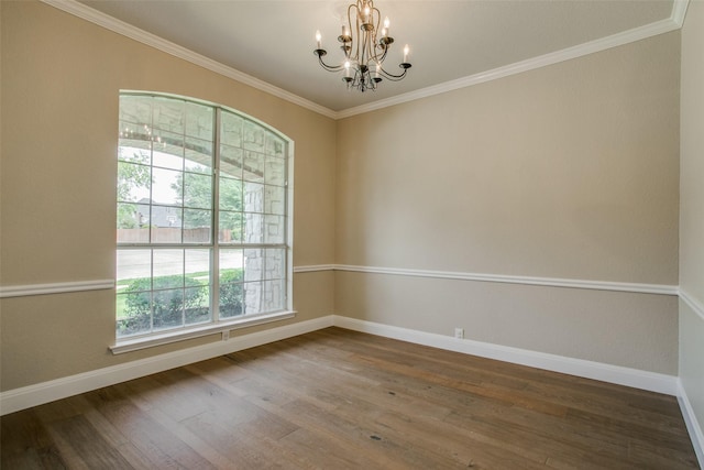 2501 Del Largo Way, Frisco, TX 75033 - unfurnished room featuring baseboards, a chandelier, ornamental molding, and wood finished floors