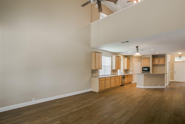 2501 Del Largo Way, Frisco, TX 75033 - kitchen with black microwave, baseboards, ceiling fan, dark wood-type flooring, and dishwasher