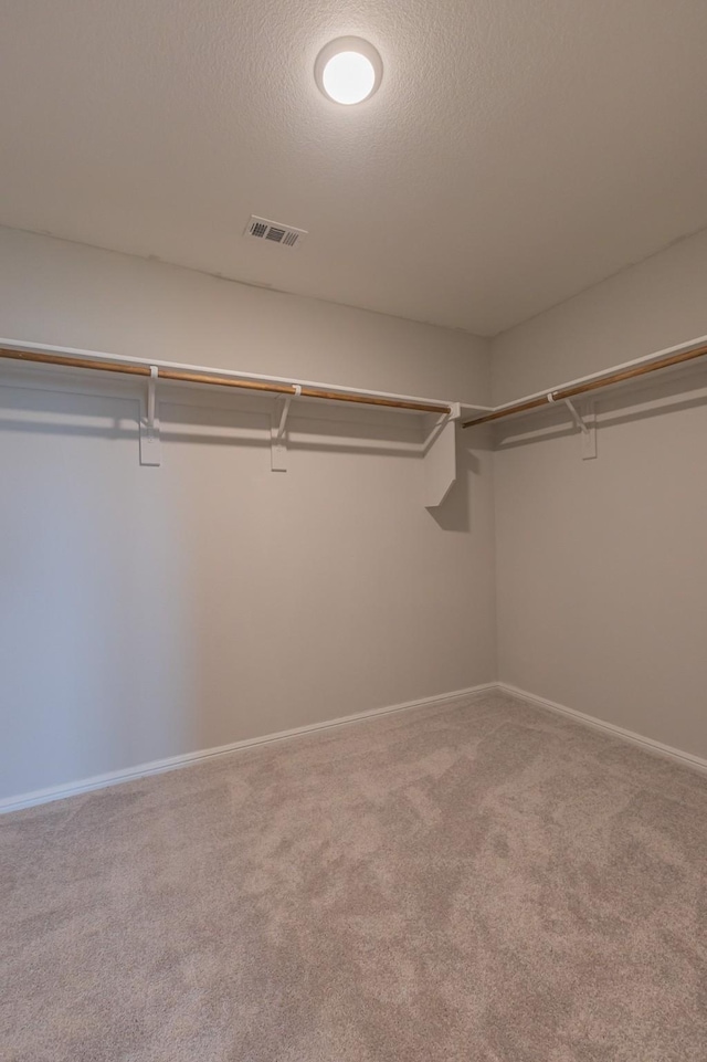 6000 Sutton Fields Trl, Celina, TX 76227 - spacious closet featuring visible vents and carpet floors