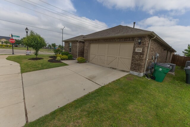 6000 Sutton Fields Trl, Celina, TX 76227 - view of side of home featuring roof with shingles, brick siding, a garage, a yard, and driveway