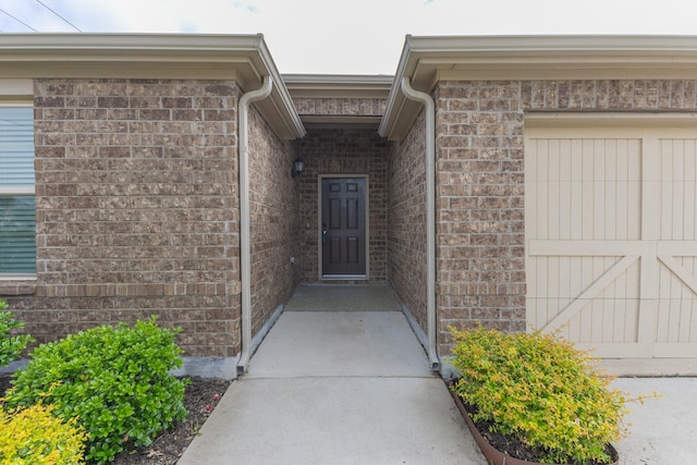 6000 Sutton Fields Trl, Celina, TX 76227 - doorway to property with brick siding and a garage