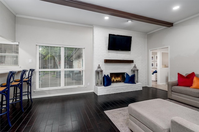 living area featuring crown molding, a fireplace, baseboards, wood-type flooring, and recessed lighting