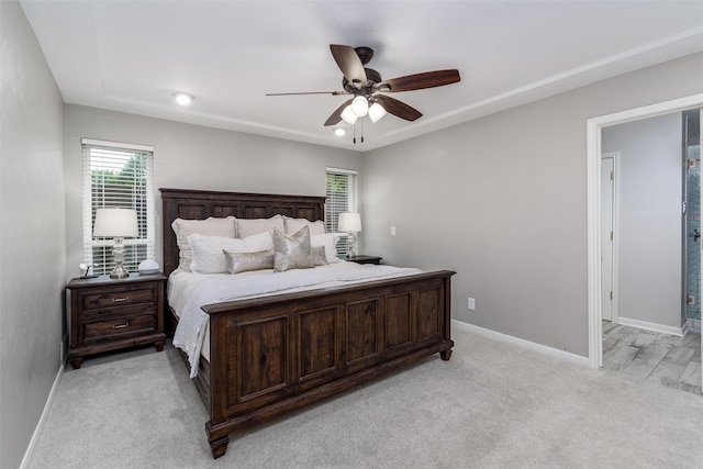 bedroom with recessed lighting, baseboards, light carpet, and ceiling fan