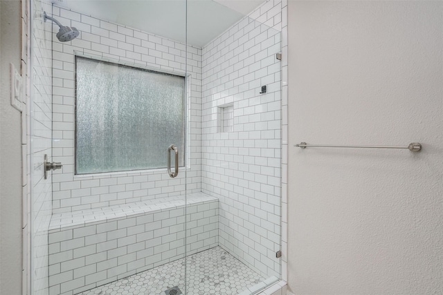 full bath featuring a stall shower