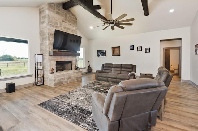 170 Rolling Hills Blvd, Alvord, TX 76225 - living room with a ceiling fan, a fireplace, beam ceiling, high vaulted ceiling, and baseboards