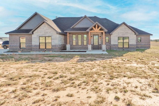 170 Rolling Hills Blvd, Alvord, TX 76225 - view of front of house with stone siding and brick siding