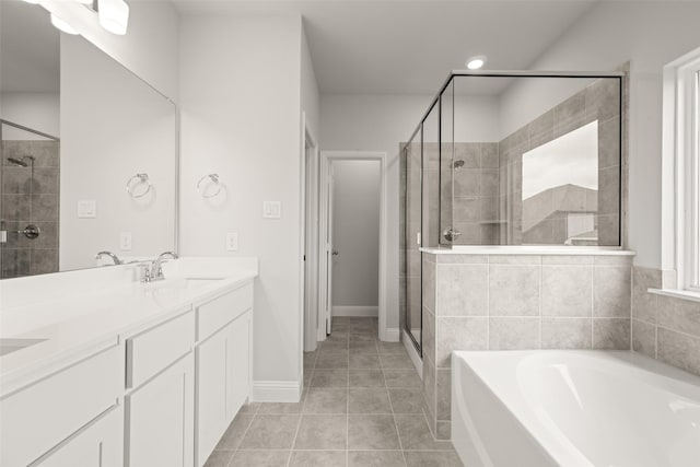 510 Reatta Dr, Justin, TX 76247 - full bathroom with a shower stall, a bath, double vanity, and tile patterned floors