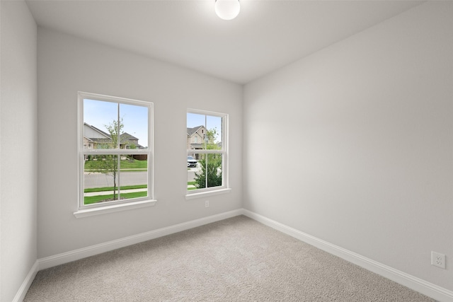 510 Reatta Dr, Justin, TX 76247 - carpeted empty room featuring baseboards
