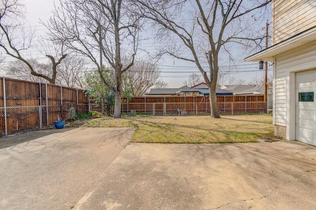 view of yard featuring a fenced backyard and a patio