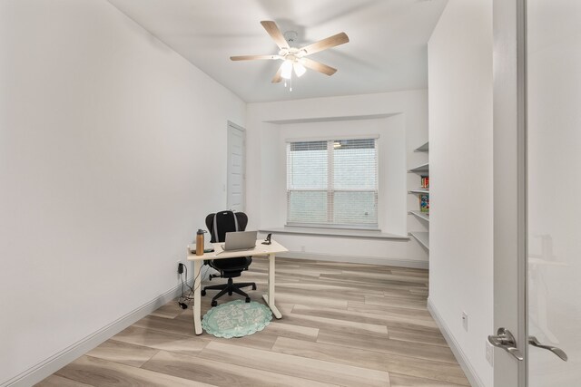 5617 Winona Ln, Mckinney, TX 75071 - office space with a ceiling fan, light wood-style floors, and baseboards