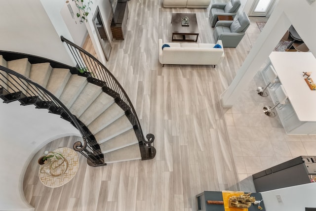 5617 Winona Ln, Mckinney, TX 75071 - staircase with wood finished floors