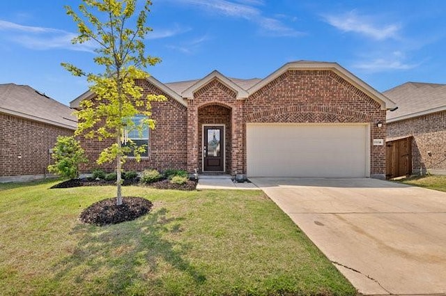 view of front facade featuring concrete driveway, brick siding, a front yard, and a garage