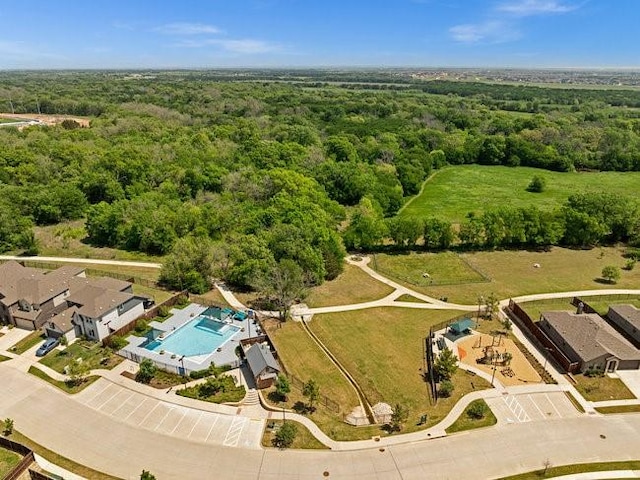 bird's eye view featuring a view of trees