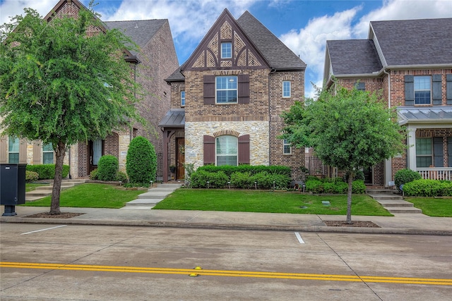 7401 Collin Mckinney Pkwy, Mckinney, TX 75070 - view of front facade featuring brick siding and a front lawn