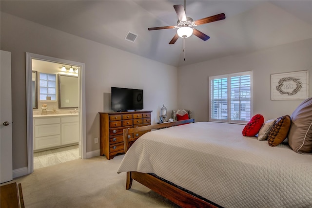 7401 Collin Mckinney Pkwy, Mckinney, TX 75070 - bedroom featuring light carpet, connected bathroom, baseboards, and ceiling fan