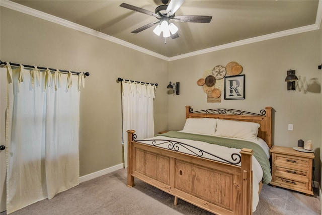 bedroom with crown molding, a ceiling fan, baseboards, and light carpet