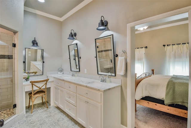 ensuite bathroom featuring crown molding, a shower stall, ensuite bath, and a sink