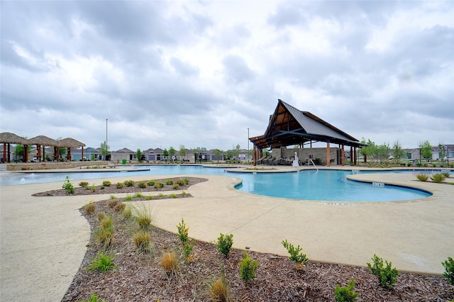 pool featuring a gazebo and a patio area