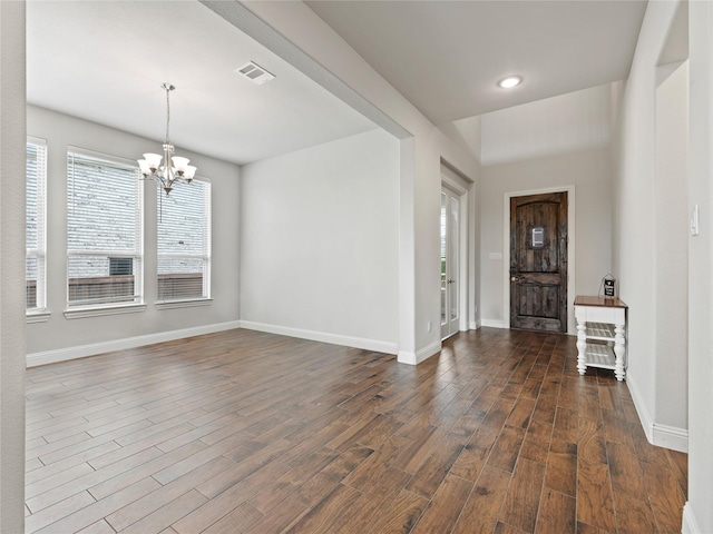 entryway with dark wood-style flooring, visible vents, baseboards, a notable chandelier, and recessed lighting