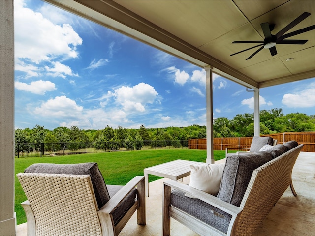 view of patio / terrace with a fenced backyard, a ceiling fan, and an outdoor hangout area