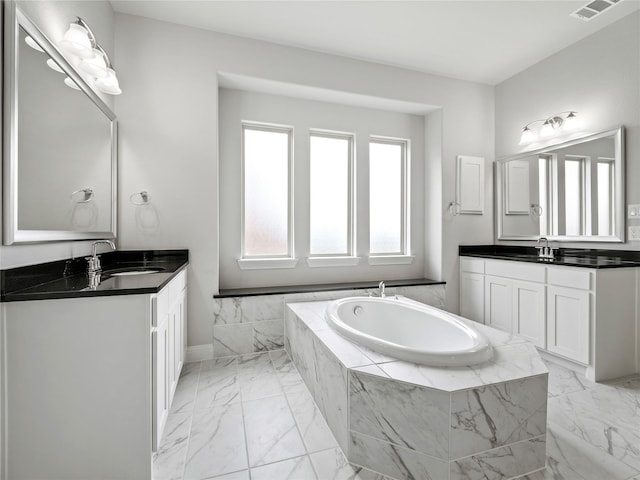 full bath featuring visible vents, two vanities, a sink, baseboards, and marble finish floor
