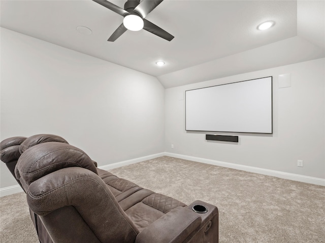 carpeted home theater room featuring recessed lighting, ceiling fan, baseboards, and lofted ceiling