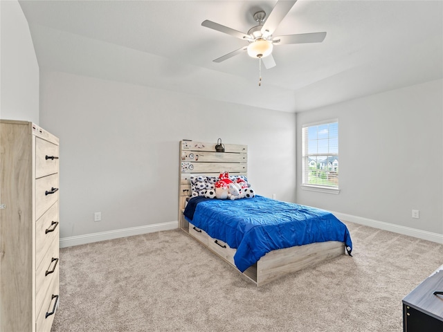 bedroom featuring baseboards, carpet, and a ceiling fan