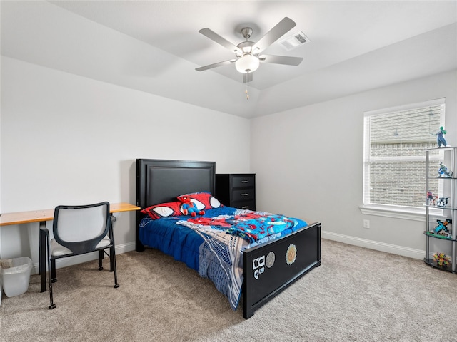 bedroom featuring visible vents, a ceiling fan, baseboards, and carpet floors