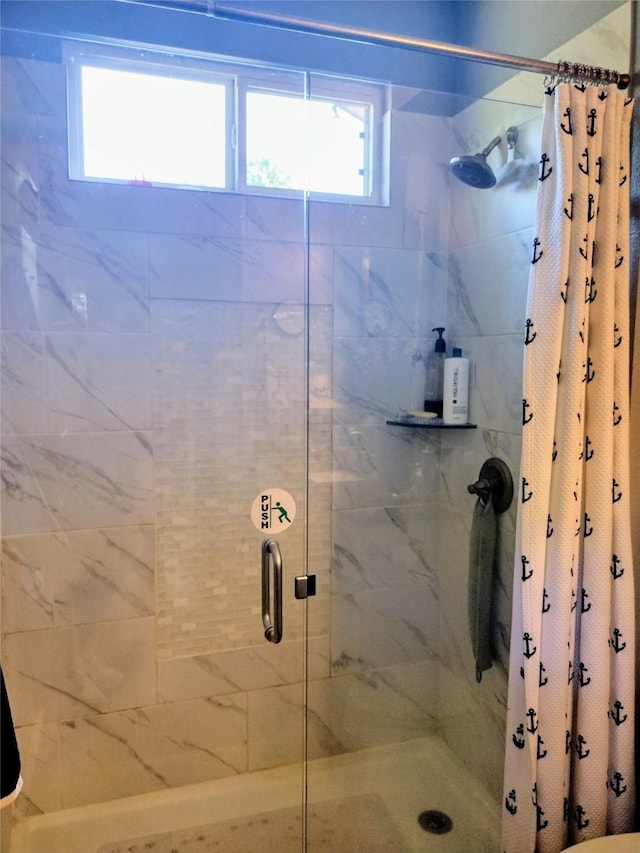 full bath featuring a stall shower