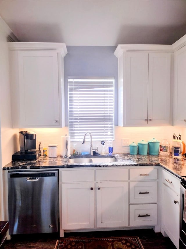 kitchen with range with electric stovetop, stainless steel dishwasher, a sink, light stone counters, and white cabinets