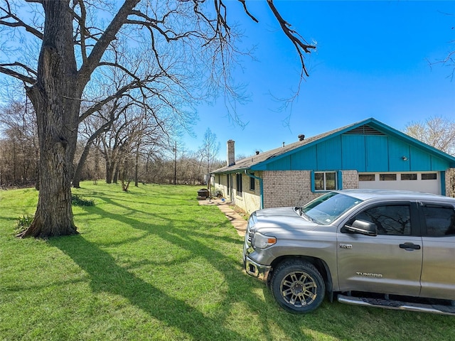 315 Low Water Rd, Grandview, TX 76050 - view of property exterior featuring a yard, brick siding, board and batten siding, and a chimney