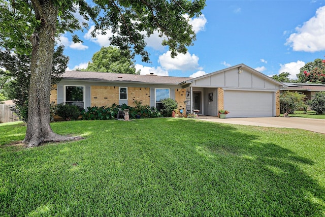 ranch-style home featuring a garage, board and batten siding, a front lawn, and brick siding