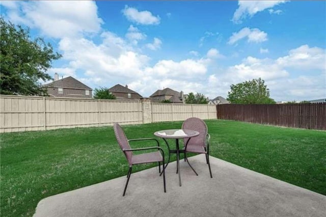 view of patio featuring a fenced backyard