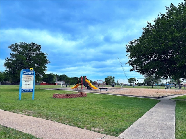 communal playground with a lawn