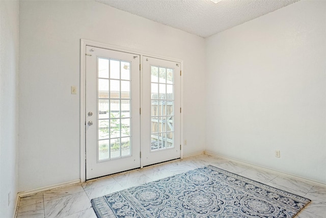 5834 Westhaven Dr Unit B, Fort Worth, TX 76132 - doorway with a healthy amount of sunlight, a textured ceiling, baseboards, and marble finish floor