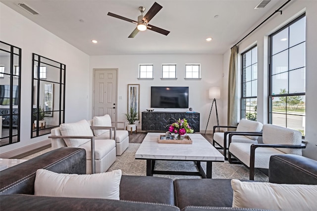 living room featuring ceiling fan, recessed lighting, wood finished floors, and visible vents