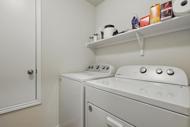 laundry area with laundry area and washer and dryer