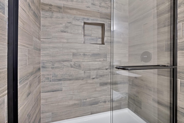 bathroom featuring a stall shower