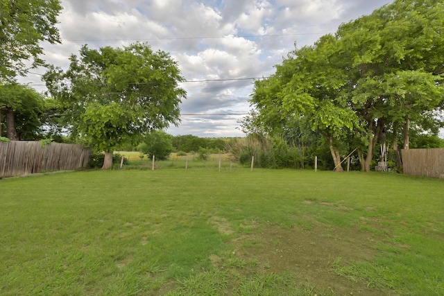 view of yard featuring fence