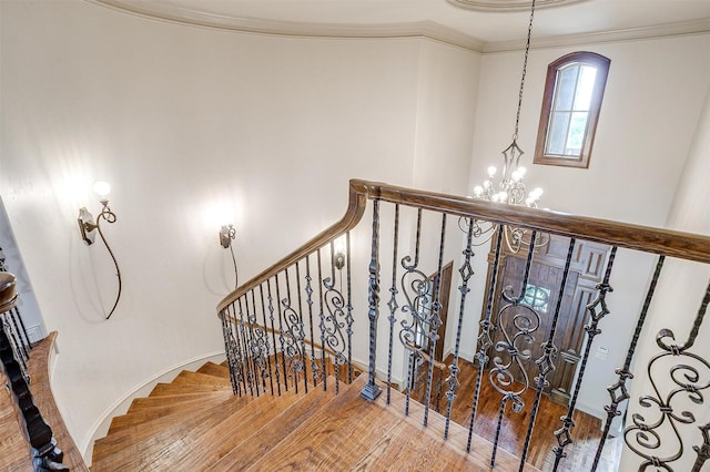 1342 Steeple Chase Ln, Aledo, TX 76008 - staircase with ornamental molding, wood finished floors, and a chandelier