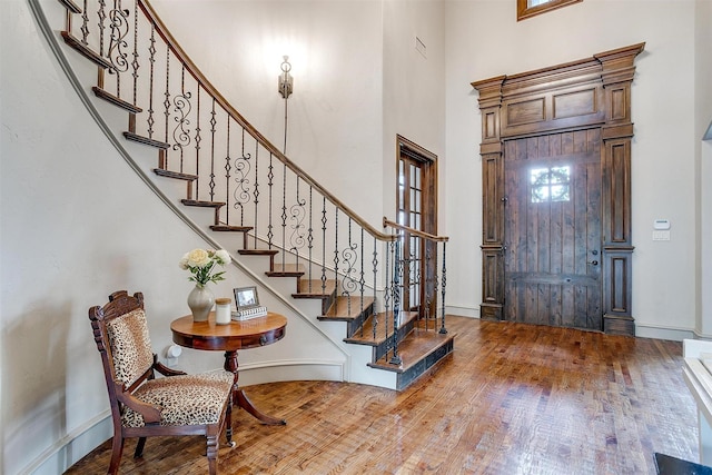 1342 Steeple Chase Ln, Aledo, TX 76008 - foyer entrance with baseboards, a high ceiling, stairs, and wood finished floors