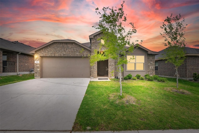 624 Whitecomb Ln, Justin, TX 76247 - ranch-style house featuring a lawn, brick siding, concrete driveway, and a garage