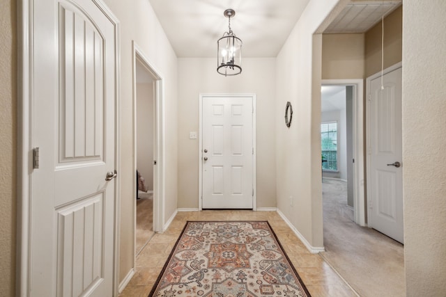 entrance foyer with a chandelier