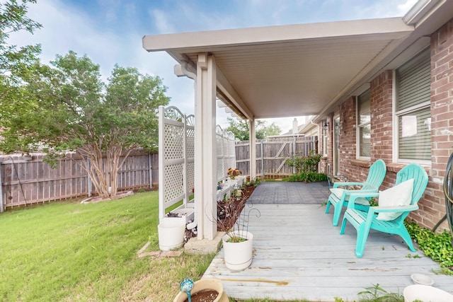 3073 Dusty Ridge Dr, Rockwall, TX 75032 - wooden terrace with a fenced backyard and a yard