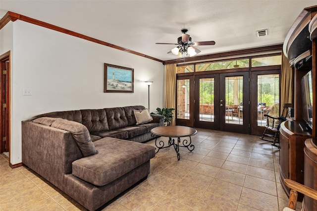 200 Bushwhacker Dr, Mabank, TX 75156 - living area with a ceiling fan, french doors, visible vents, crown molding, and light tile patterned floors