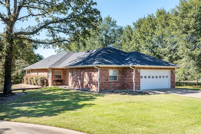 200 Bushwhacker Dr, Mabank, TX 75156 - ranch-style house with an attached garage, driveway, a front lawn, and brick siding