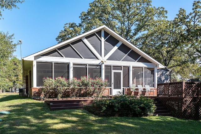 200 Bushwhacker Dr, Mabank, TX 75156 - rear view of property with a lawn, a wooden deck, stairs, and a sunroom